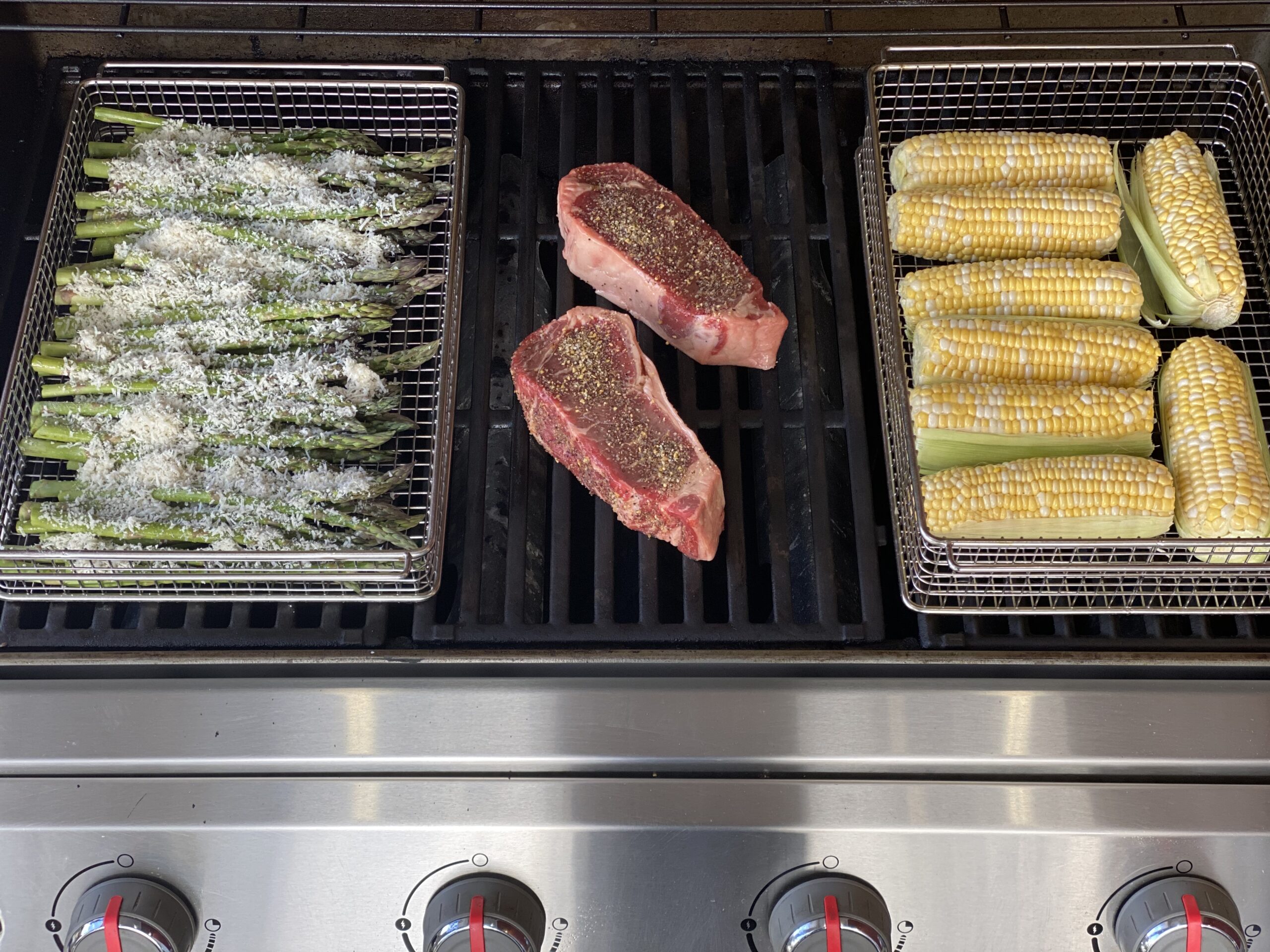 Asparagus, steak and corn on the grill